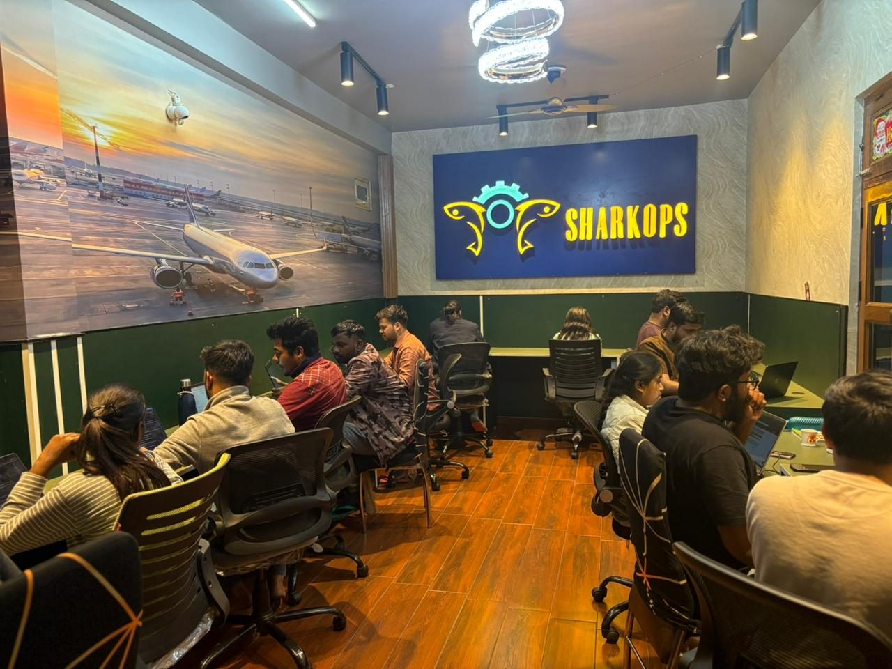 The SharkOps team at the office